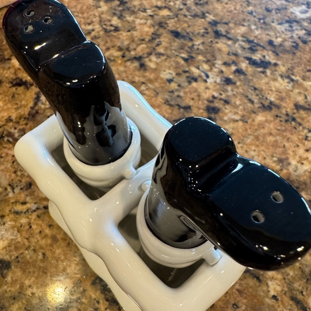 Salt and pepper Santa feet in a chimney. New